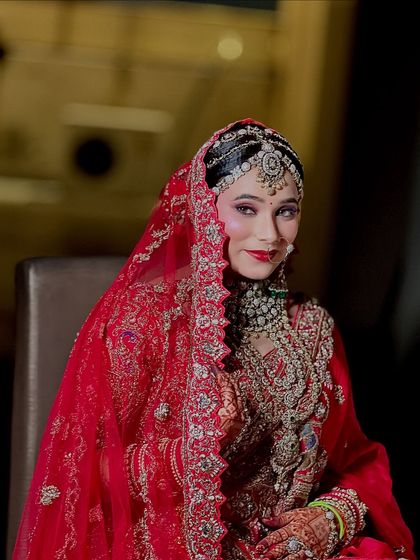 A queen is not born, she is made. This is my gorgeous royal bride, looking absolutely regal with her heavy jewelry and elegant makeup.