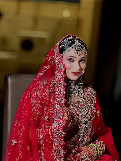 A queen is not born, she is made. This is my gorgeous royal bride, looking absolutely regal with her heavy jewelry and elegant makeup.