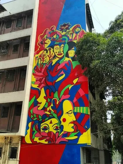 "The Genesis" by Krantinaari and the Marol Art Village Community is a powerful statement on female presence and power. The mural uses vibrant colors and flowing forms to advocate for smashing patriarchy and celebrating womanhood.