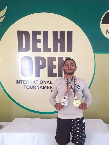Posing with my Gold and Silver medals from the Delhi Open. A successful start to the year, winning in both my weight category and the open weight division.