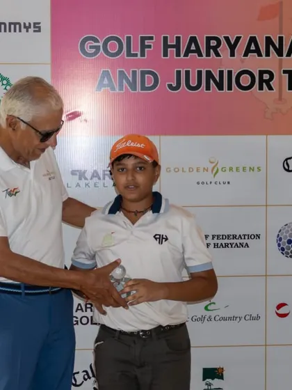 Shauryaveer Behera is awarded his 1st place trophy at the Haryana State Golf Federation Tournament.