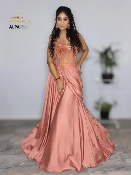 A full-length pose showing the confident stance of the model in her stunning cocktail attire.