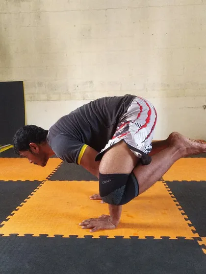 After a tough strength session, I like to incorporate some yoga. This is the Bakasana (Crow Pose), which is great for balance and core strength.