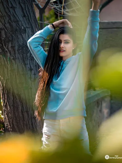 Another shot from the same series, playing with natural frames and light to create a dreamy, sun-drenched feel.