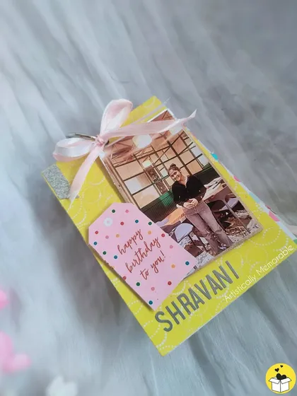 A bright yellow mini tag book with a 'Happy Birthday' tag, a perfect personalized birthday card alternative.