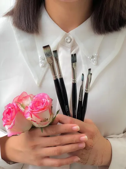 My hands, my tools, and a few flowers. This is my world in a single frame.