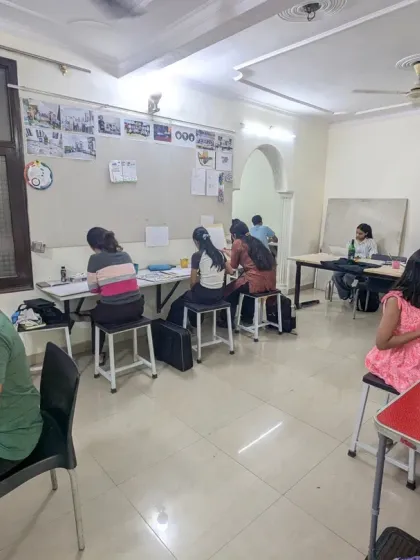 A wide shot of our studio during a busy class. You can see students of various ages working diligently on their individual projects.