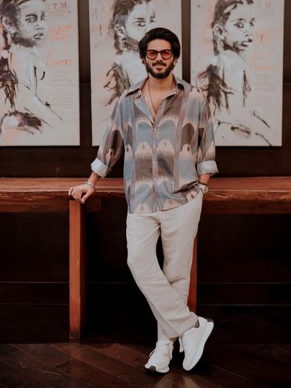 For the 'King of Kotha' promotions, I styled Dulquer Salmaan in this custom-printed shirt I designed myself. Paired with casual white pants and sneakers, it’s a fresh, modern look.