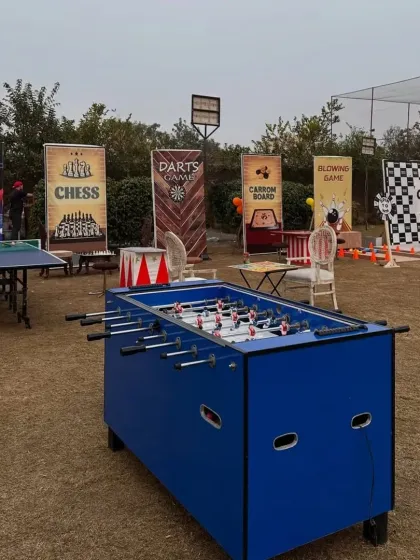 An array of games set up for an outdoor pre-wedding function. I included classics like foosball, table tennis, and chess to ensure there were activities that guests of all ages could enjoy.