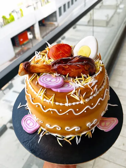 Yes, this is a cake! I love a creative challenge, and this hyper-realistic Chicken Biryani cake was a blast to make. Every detail, from the fondant chicken leg and egg to the rice texture, is completely edible, making it a perfect quirky cake for a foodie's birthday.