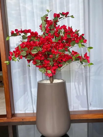 Love the look of flowers but worried about the upkeep? Our artificial plants are the answer. This vibrant bougainvillea brings a pop of colour and looks incredibly real, with zero effort needed.