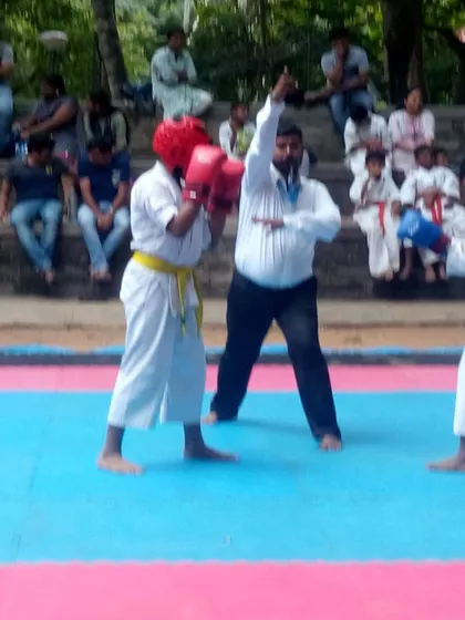 A tense moment between two competitors. Focus and readiness are key in a tournament setting.