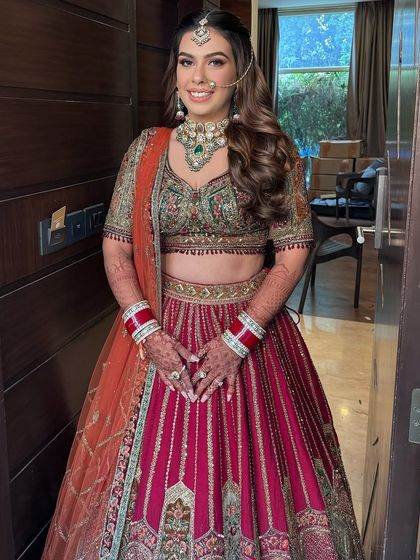 A beautiful bridal look with soft, open waves, perfect for a bride who wants a natural yet elegant style.