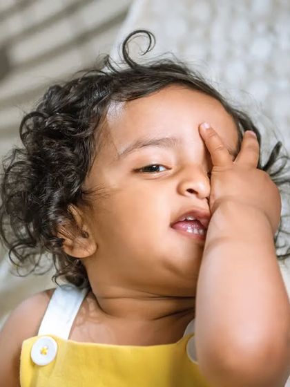 "Are we done yet?" Even the tired and funny faces are worth capturing. These moments add so much character and humor to your baby's photo gallery.