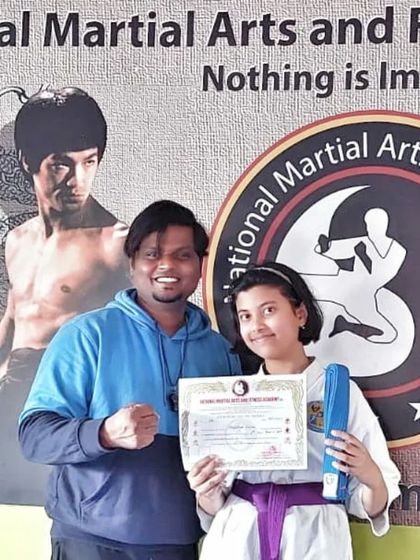 National Martial Arts and Fitness Academy - Kids Martial Arts & Fitness The Journey of Discipline: Belt Graduations photo 35