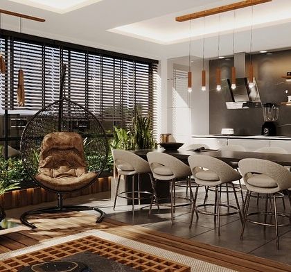 A closer look at the sunroom's dining and kitchen area. Faux plants in modern planters are used to soften the contemporary design and add a touch of natural color.