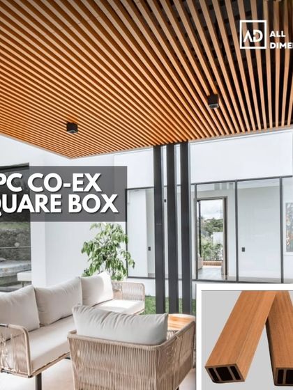 WPC co-extrusion square box louvers create a stylish and functional pergola for this outdoor seating area. This material is ideal for exteriors as it withstands sun and rain while maintaining its wood-like appearance.