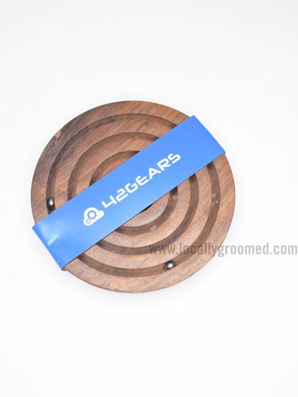 A wooden labyrinth game we created for 42Gears. This unique desk item is a fun, engaging, and eco-friendly gift that encourages a mental break during the workday.