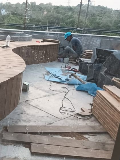 Our team is skilled in crafting custom-built furniture. Here you can see the process of building a curved wooden bench on-site, designed to fit the unique contours of a terrace.