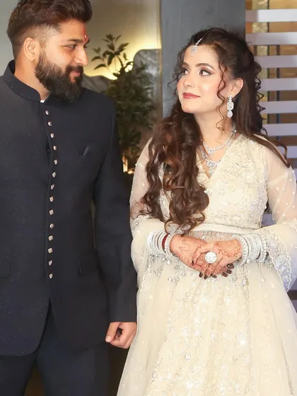 The couple sharing a look, a candid moment that feels full of love and happiness.