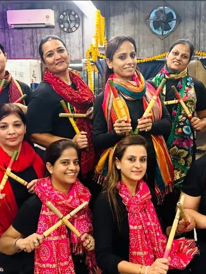 Our dandiya squad ready with their sticks. A great picture showing the unity and excitement of our members.