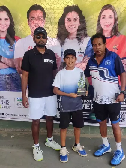 A young winner is recognized for his performance in the TPL-ITA tournament. These moments highlight the culmination of hard work and our dedication to celebrating player success.