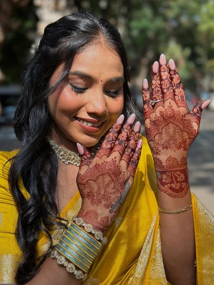 Another beautiful shot of this happy client. Her smile and the beautiful henna stain say it all.