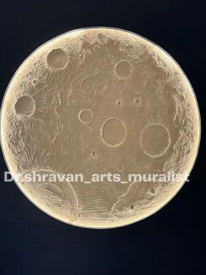 A close-up of the finished moon wall mural, showing the incredible texture of the craters and surface. The backlighting makes it glow, creating a stunning focal point in a dark room.