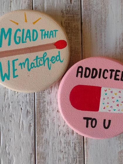 A duplicate of 81, quirky and fun magnets for your special someone. "I'm glad that we matched" and "Addicted to U" are playful, hand-painted tokens of affection.