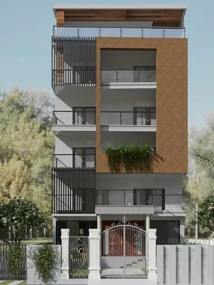This multi-story residential building design incorporates modern elements like vertical louvers for privacy and sun shading, along with integrated planters for a touch of green. The facade combines brick texture with smooth render, showcasing our ability to blend materials effectively.