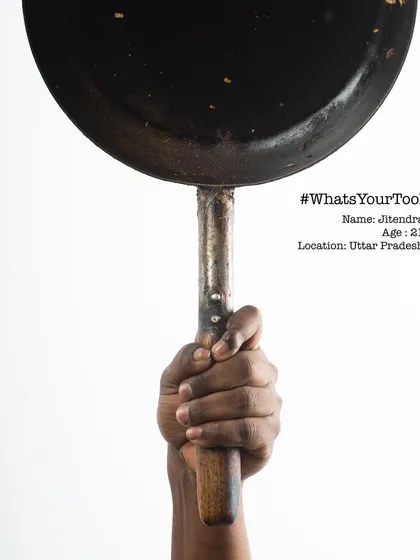 In 2016, I started a series called "What's Your Tool," asking professionals to bring their most important tool to the studio. This is Jitendra, a 21-year-old cook, holding his pan.