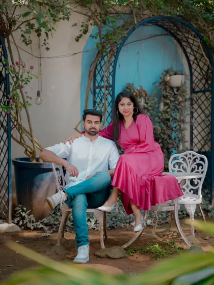 A chic and relaxed portrait in a garden cafe setting. This style is great for a casual and modern "Save the Date" announcement.