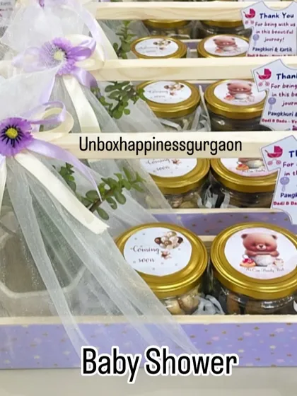 A close-up of the lavender-themed favor, showing the "Coming Soon" and "We Can Bearly Wait" stickers on the treat jars.