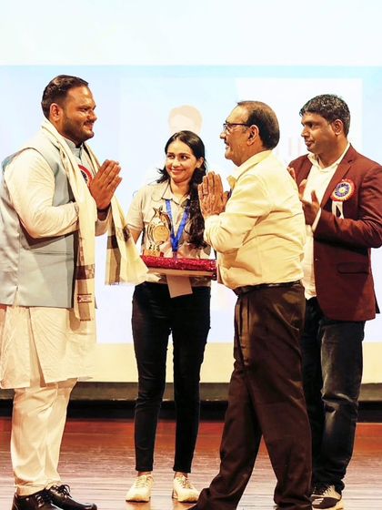Exchanging greetings on stage at the Ayurveda Innovations Summit. It was an honor to share the stage with other leading figures in the field of Ayurveda.