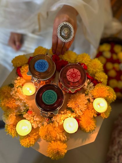 A top-down view of our festive tray, featuring hand-painted jars and tea lights.
