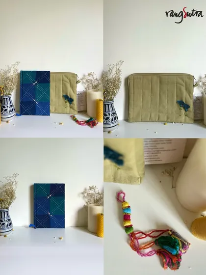This handmade gift set includes a beautiful fabric-covered journal, a quilted zip pouch, and a vibrant charm. Each piece is crafted by our artisans to be a thoughtful and sustainable gift.