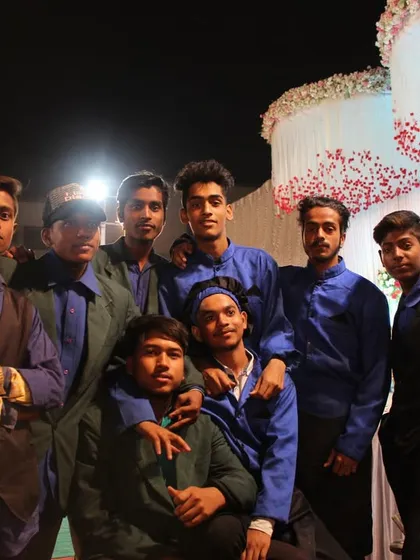 A candid moment with some of our younger team members. We are proud to have a dedicated and energetic team that works hard behind the scenes.