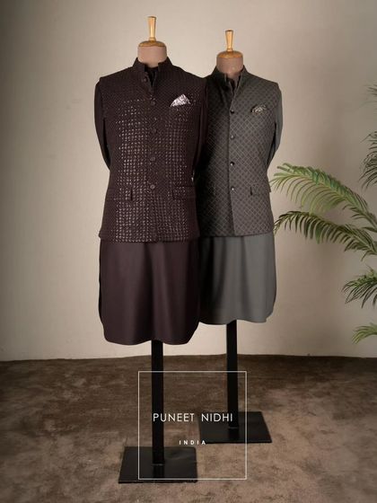The Pathani suit collection in deeper tones. A rich brown and an olive green, each paired with a textured Nehru jacket for a sophisticated festive look.