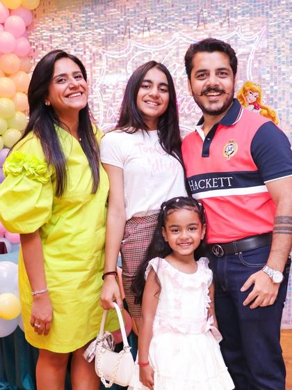 A beautiful family portrait taken at a birthday party. We provide plenty of picture-perfect spots to capture your family's memories.