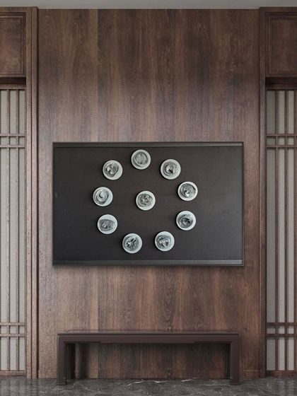 Here, the Navagraha is set against a dark wood wall, creating a powerful and grounding presence. It is perfect for interiors that value culture and meaning.