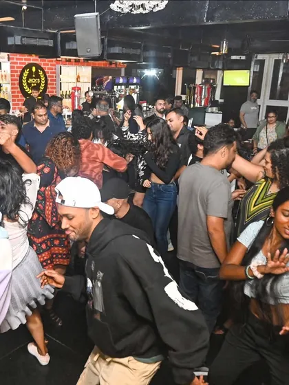 Another angle of a Saturday night session. The energy is high, and the crowd is loving the hip-hop and dance music mix.