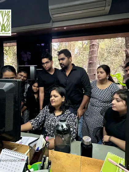 Our team gathered around a screen, collaborating on a design. This image captures the spirit of teamwork and shared focus that is central to our process, ensuring every project benefits from our collective expertise.