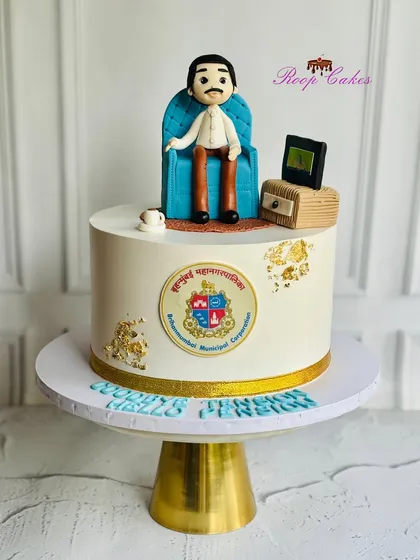 Goodbye tension, hello pension. A sweet tribute to years of dedication at BMC, this cake features a custom fondant figurine, a miniature desk, and the municipal corporation's logo.