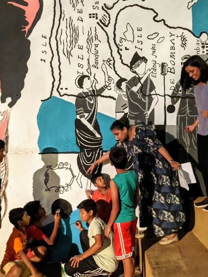 Community members and children participate in painting a mural at The Steps. We believe in a hands-on, community-led approach, where locals are directly involved in shaping their own public spaces.