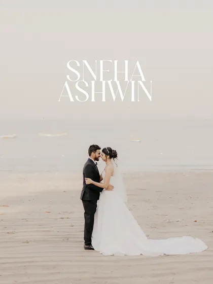 A serene and romantic portrait on the beach. We specialize in destination wedding photography, using the natural landscape to create minimalist and beautiful compositions that focus entirely on the couple.