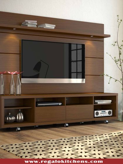 A classic floating TV unit in a warm wood finish. The design includes open shelves for media players and drawers for concealed storage, keeping the area tidy.