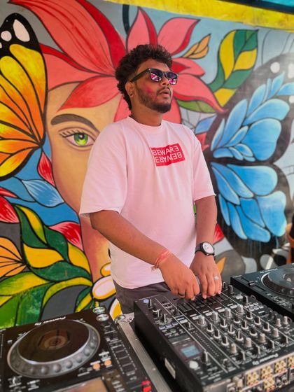 A different angle from the same vibrant Holi party. The butterfly mural behind me perfectly captured the free spirited vibe of the day's music and celebration.