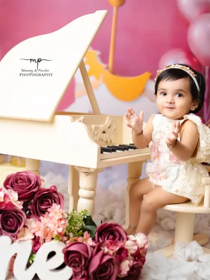 Clapping her hands with joy, the birthday girl loves her personal piano concert. These sessions are designed to be interactive and fun for the little ones.