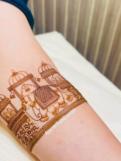 The beginning stages of a beautiful design, showing the outline of an elephant procession. This is where the magic starts.