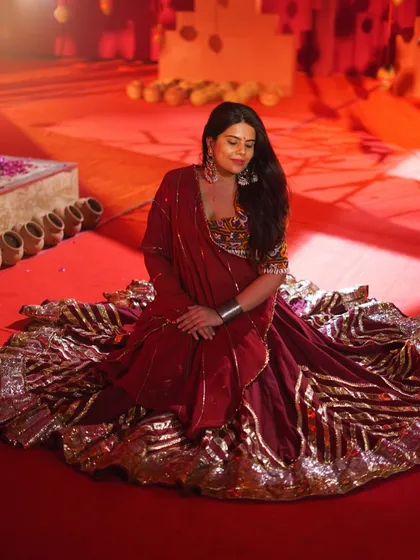 A moment of peace amidst the energy of Garba. The flare of the ghagra is one of the most beautiful parts of this dance form.